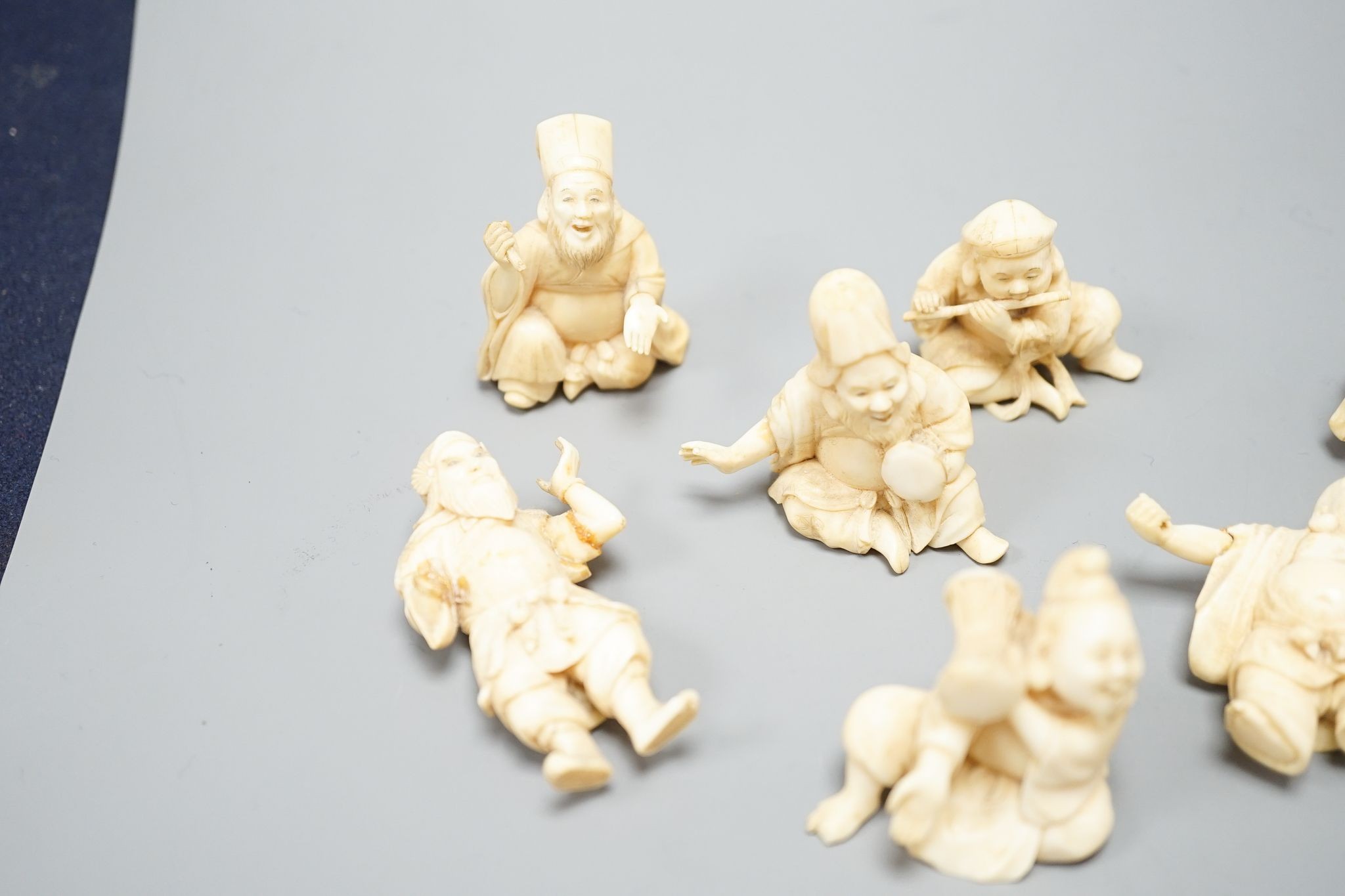 A set of seven Japanese ivory okimono of the seven gods of Happiness, Meiji period, unsigned, tallest 4cm